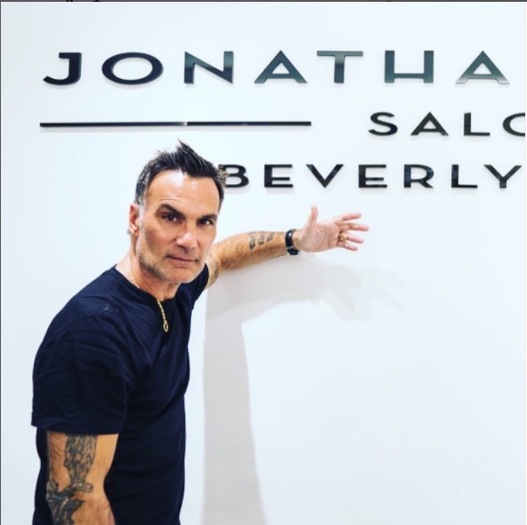 Jonathan Antin poses in front of his Salon